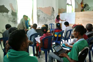 A teacher talks to the class.