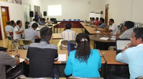 Participants give their attention to the presentation from the national technical team