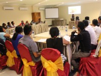 Participants are listening to the procurement process presentation