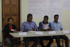 Participants taking part in role-plays on accountability meetings in the village
