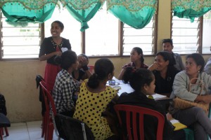 The participants presenting topics in a group discussion